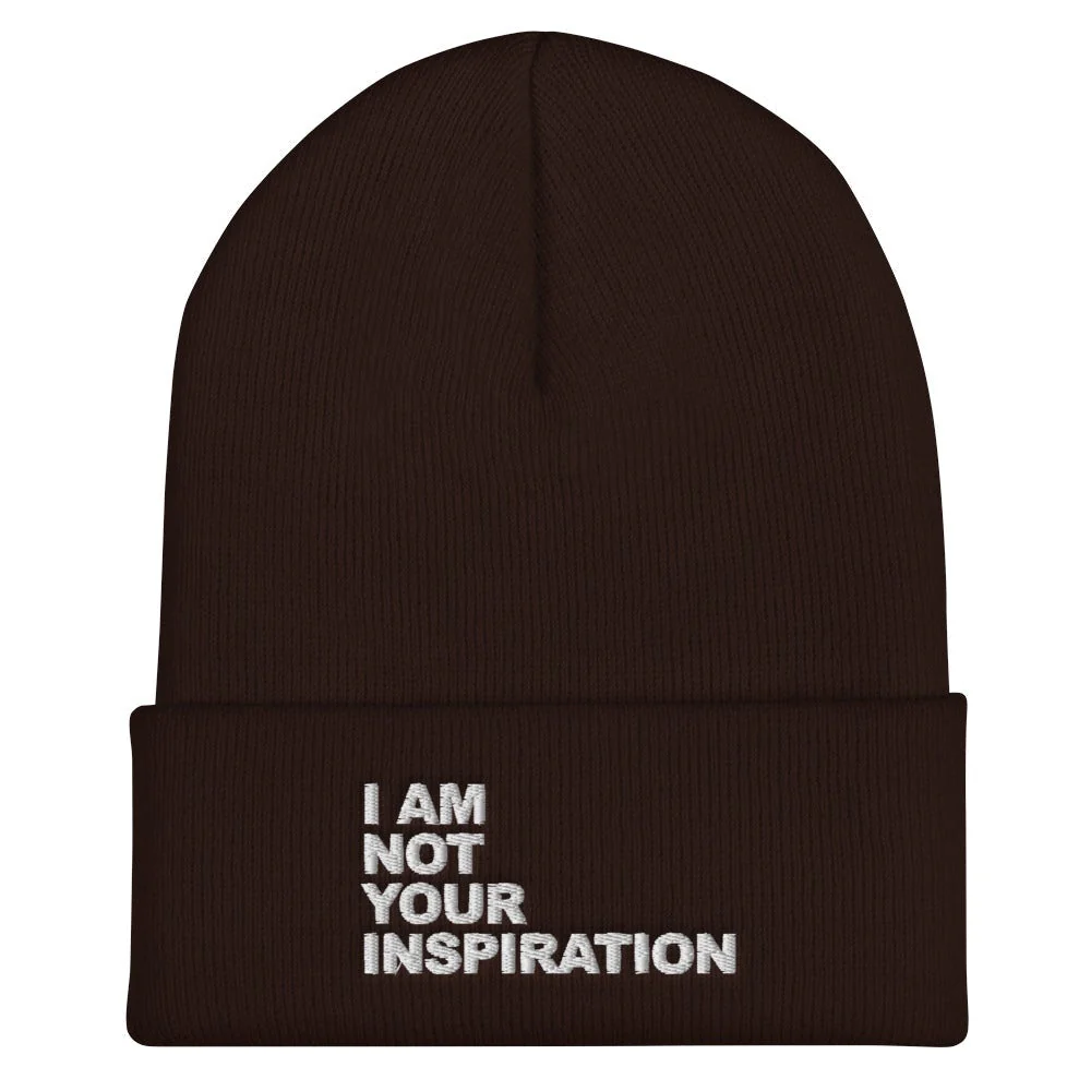 Black beanie hat which says I am not your inspiration
